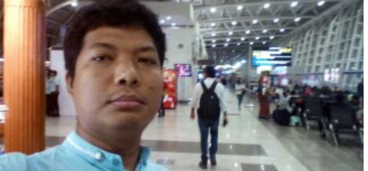 solitary traveler sitting in an empty airport